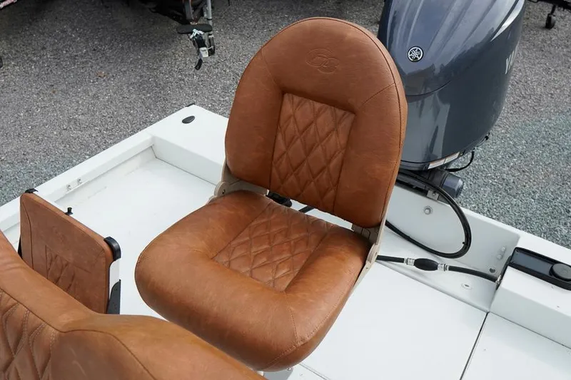 Slide: The Image of Brown leather seat on 2026 G3 Bay 21 GX Tunnel boat, featuring diamond stitching. - 19