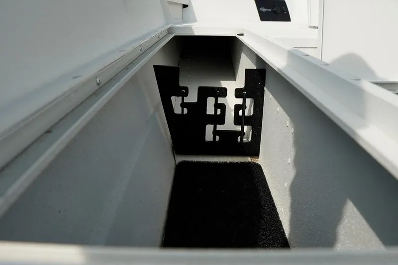 Slide: The Image of Interior view of 2026 G3 Bay 21 GX Tunnel boat storage compartment. - 23