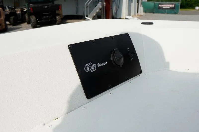 Slide: The Image of 2026 G3 Bay 21 GX Tunnel boat interior with G3 Boats logo panel. - 25
