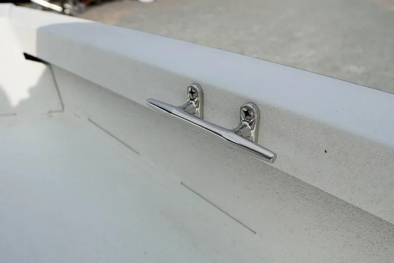Slide: The Image of 2026 G3 Bay 21 GX Tunnel boat cleat on white deck surface. - 26