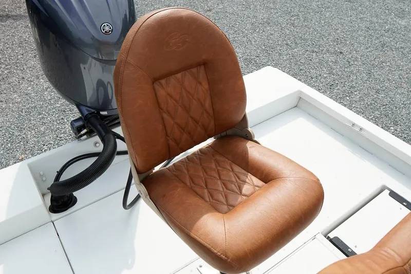 Slide: The Image of Brown leather seat on 2026 G3 Bay 21 GX Tunnel boat, featuring diamond stitching. - 27