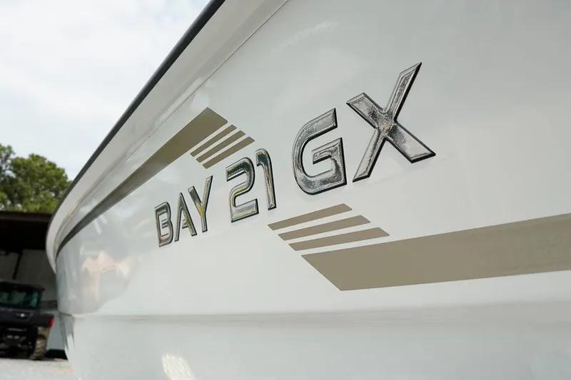 Slide: The Image of 2026 G3 Bay 21 GX Tunnel boat with sleek design and bold lettering. - 28