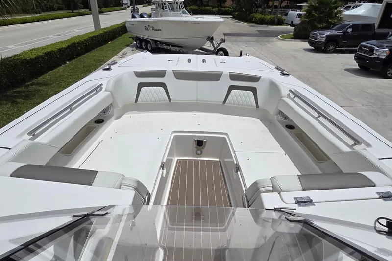 Slide: The Image of 2023 World Cat 280 DC-X boat interior with spacious seating and modern design. - 11