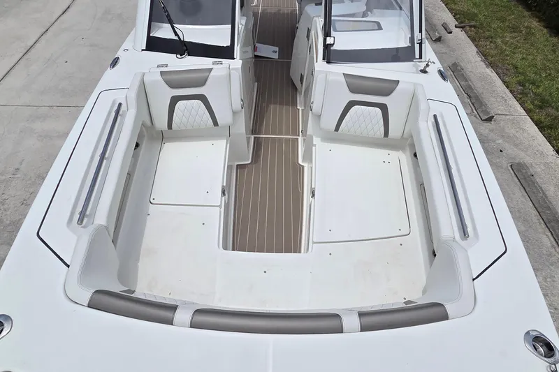 Slide: The Image of 2023 World Cat 280 DC-X boat interior with spacious seating and modern design. - 14