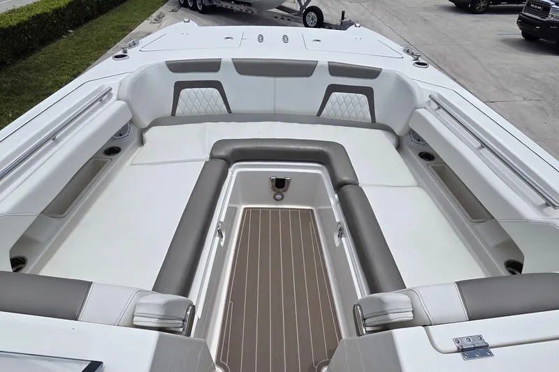 Slide: The Image of 2023 World Cat 280 DC-X boat interior with spacious seating and modern design. - 18