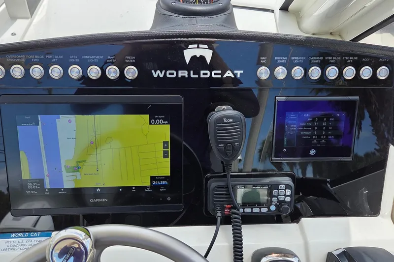 Slide: The Image of Dashboard of 2023 World Cat 280 DC-X boat with navigation and communication systems. - 22