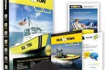 Slide: The Image of Sea Tow promotional materials featuring a boat, highlighting marine assistance services. - 37