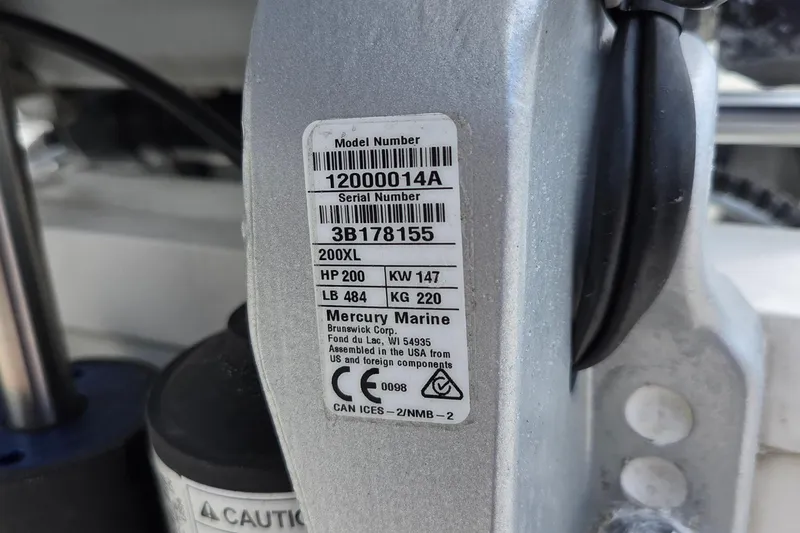Slide: The Image of Close-up of a Mercury Marine engine label on a 2023 World Cat 280 DC-X boat. - 7