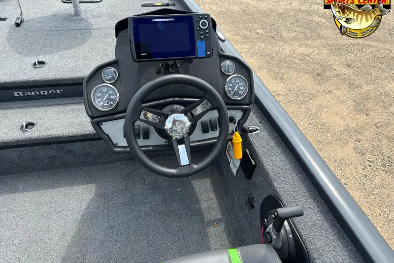 Slide: The Image of 2021 Ranger RT178 boat dashboard with steering wheel and navigation system. - 6
