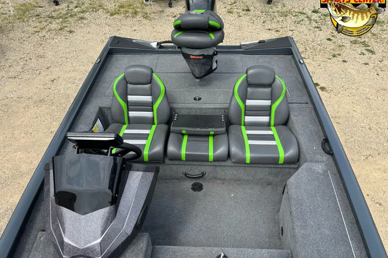 Slide: The Image of 2021 Ranger RT178 boat interior with gray and green seats, steering console, and fishing deck. - 7