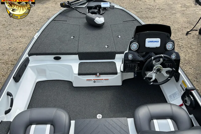 Slide: The Image of Interior of a 2025 Nitro Z17 boat featuring a modern steering console and seating. - 5