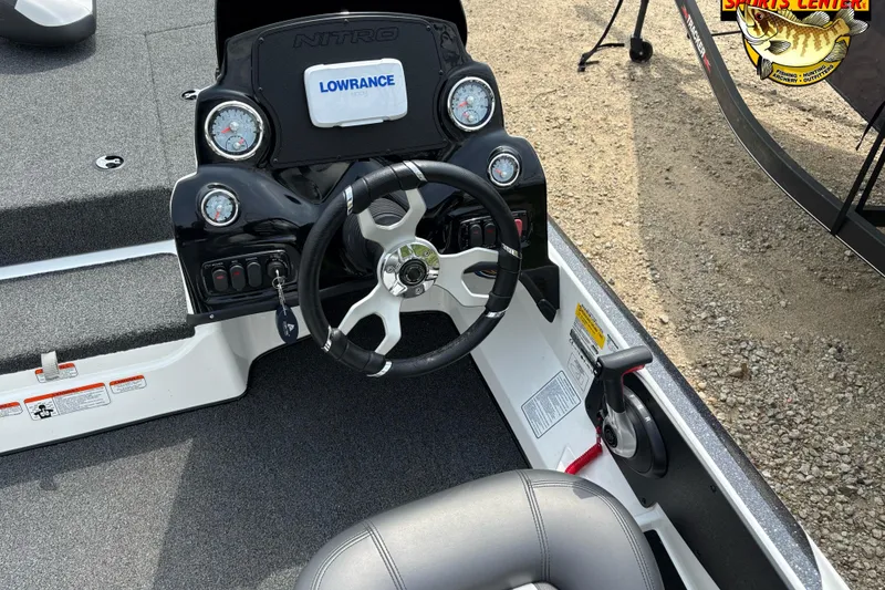 Slide: The Image of Steering console of a 2025 Nitro Z17 boat with Lowrance electronics. - 6