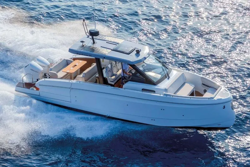Slide: The Image of Manufacturer Provided Image: 2025 Beneteau Gran Turismo 35 cruising on open water, showcasing sleek design and performance. - 1
