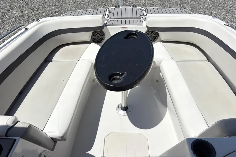 Slide: The Image of 2022 Starcraft SVX 191 OB boat interior with seating and table. - 10