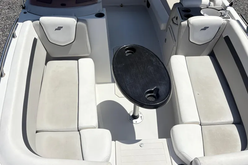 Slide: The Image of 2022 Starcraft SVX 191 OB boat interior with seating and table. - 7