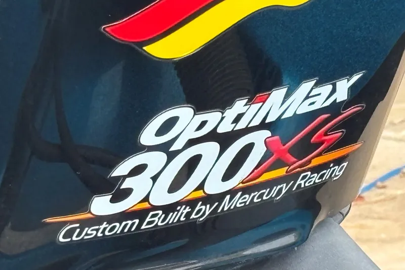 Slide: The Image of OptiMax 300XS engine decal on 2009 Triton 22 TrX, custom built by Mercury Racing. - 12