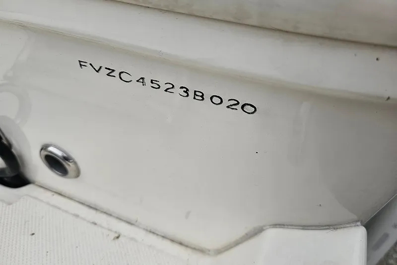 Slide: The Image of Hull identification number on 2020 Pioneer 202 Sportfish boat. - 19
