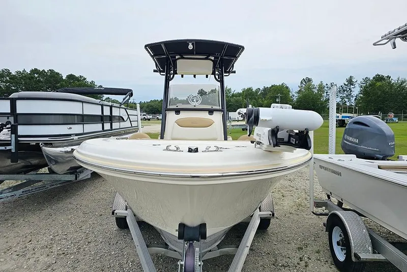 Slide: The Image of 2020 Pioneer 202 Sportfish boat on trailer, front view, with Yamaha outboard motor. - 4