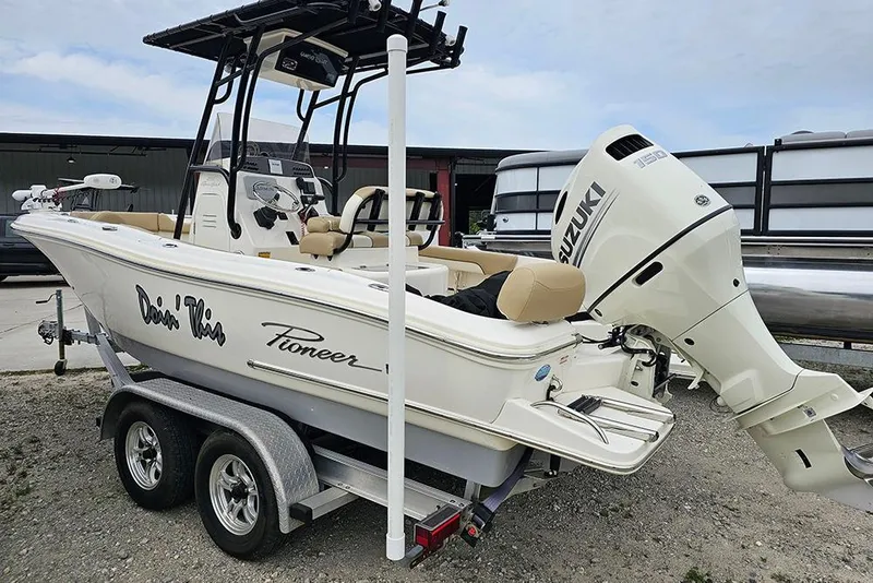 Slide: The Image of 2020 Pioneer 202 Sportfish boat on trailer with Suzuki outboard motor. - 6