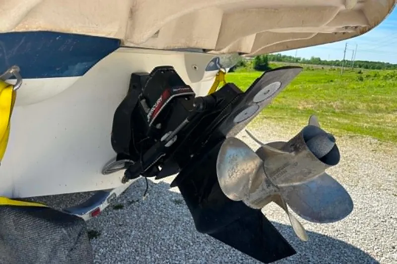 Slide: The Image of Close-up of a 2001 Monterey 248LS Montura Bowrider boat propeller and stern drive. - 4
