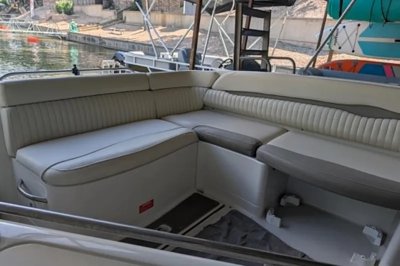 Slide: The Image of 2001 Monterey 248LS Montura Bowrider interior with spacious seating by the water. - 7
