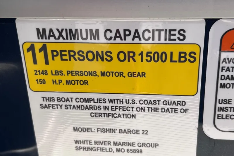 Slide: The Image of Capacity label for 2023 Sun Tracker Fishin' Barge 22 DLX, 11 persons or 1500 lbs. - 24
