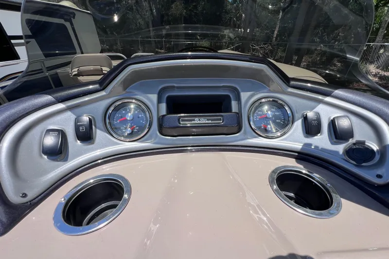 Slide: The Image of Dashboard of 2023 Sun Tracker Fishin' Barge 22 DLX with gauges and controls. - 25