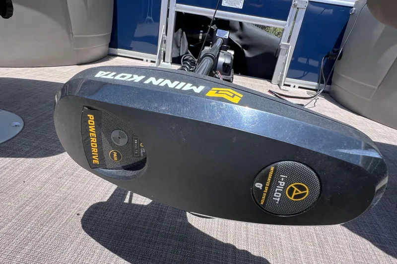 Slide: The Image of Minn Kota PowerDrive motor on 2023 Sun Tracker Fishin' Barge 22 DLX pontoon boat. - 30