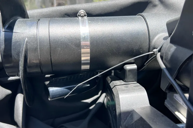 Slide: The Image of Close-up of a 2023 Sun Tracker Fishin' Barge 22 DLX steering mechanism. - 36
