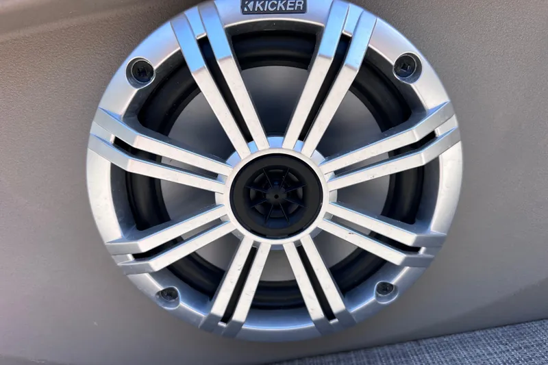 Slide: The Image of Close-up of a Kicker speaker on a 2023 Sun Tracker Fishin' Barge 22 DLX. - 38