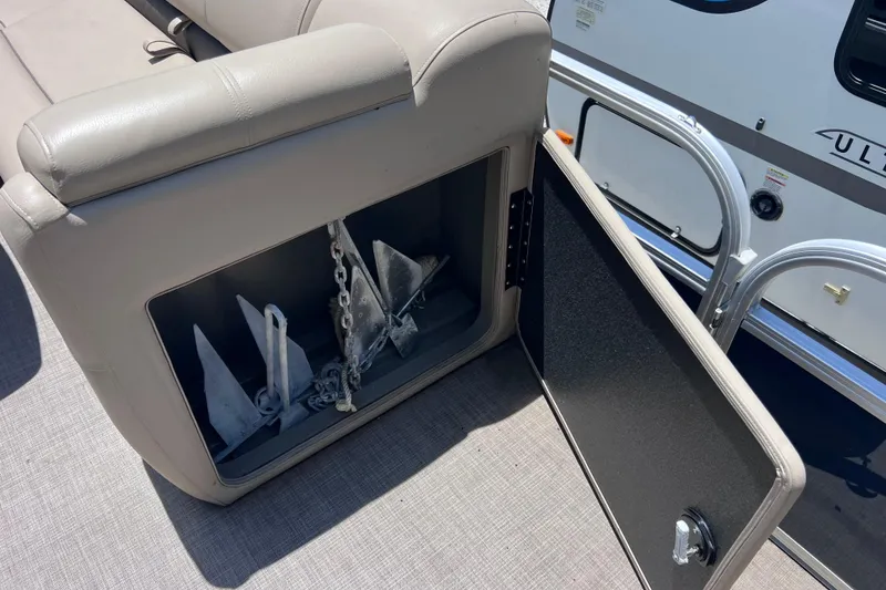 Slide: The Image of Storage compartment with anchors on a 2023 Sun Tracker Fishin' Barge 22 DLX pontoon boat. - 39