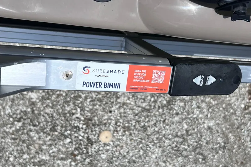 Slide: The Image of SureShade Power Bimini control on 2023 Sun Tracker Fishin' Barge 22 DLX boat. - 41