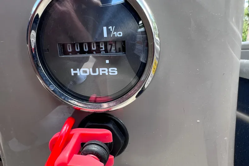 Slide: The Image of Hour meter on 2023 Sun Tracker Fishin' Barge 22 DLX showing 97 hours. - 42
