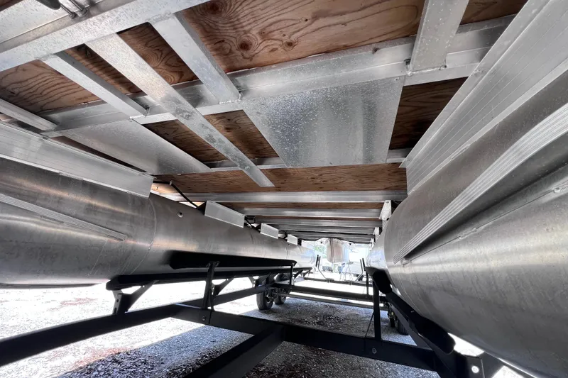 Slide: The Image of Underneath view of 2023 Sun Tracker Fishin' Barge 22 DLX pontoon boat structure. - 9