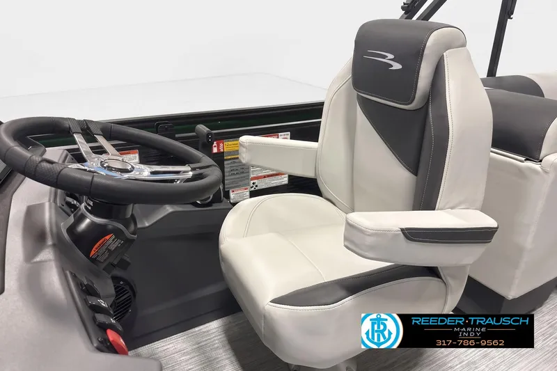 Slide: The Image of Captain's seat and steering wheel of 2026 Bennington 22 S1SR pontoon boat. - 3