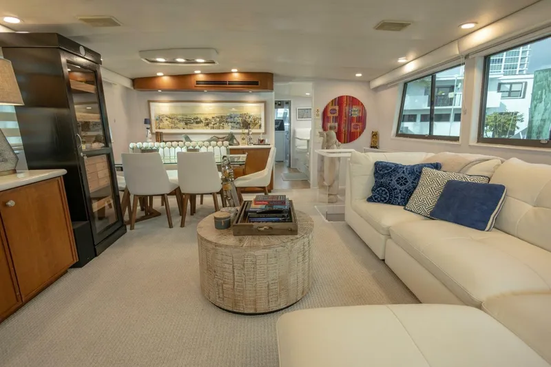 Slide: The Image of Luxurious interior of 1989 Hatteras Custom Cockpit yacht with elegant seating and decor. - 12