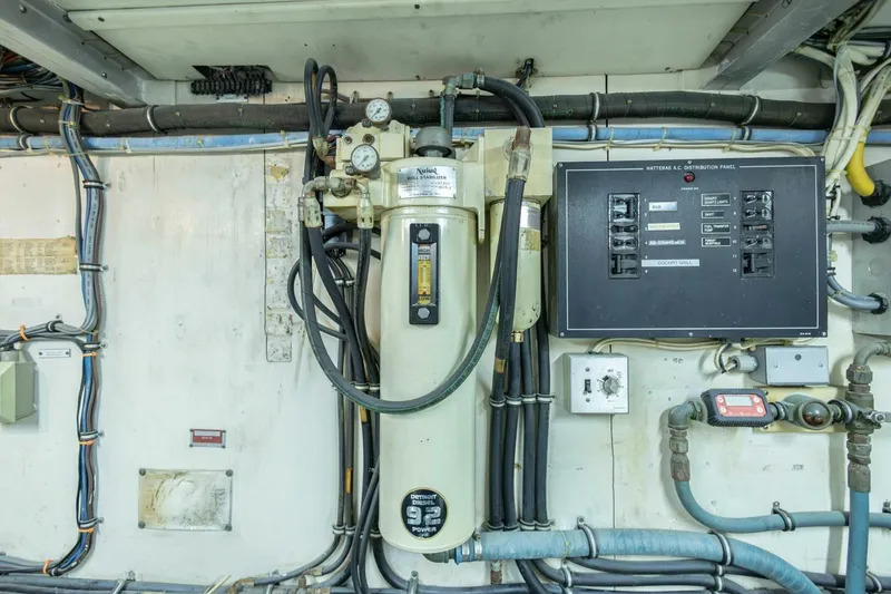 Slide: The Image of Electrical panel and equipment in 1989 Hatteras Custom Cockpit yacht engine room. - 67