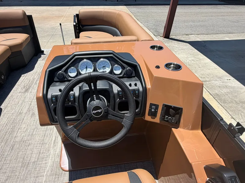Slide: The Image of 2026 Bentley Pontoons Legacy 223 helm with steering wheel and gauges. - 10