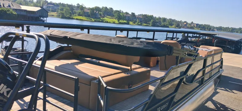 Slide: The Image of 2026 Bentley Pontoons Legacy 223 at lakeside dock. - 13