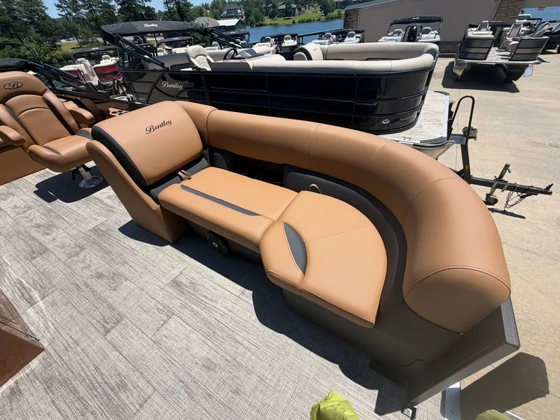 Slide: The Image of 2026 Bentley Pontoons Legacy 223 Swingback on a boat deck. - 9