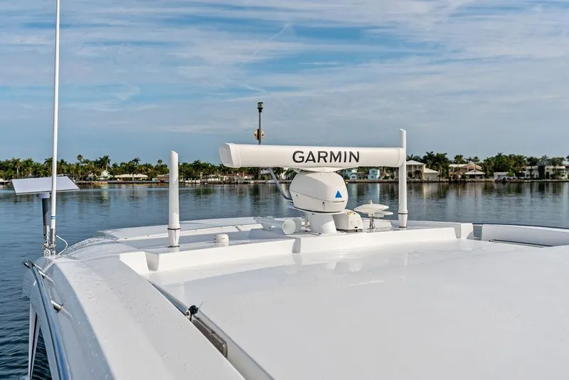 Slide: The Image of 2022 Cruisers Yachts 46 Cantius with Garmin radar on calm water. - 11