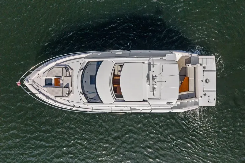 Slide: The Image of Aerial view of 2022 Cruisers Yachts 46 Cantius luxury boat on water. - 3