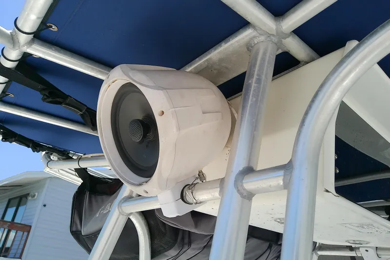 Slide: The Image of Speaker mounted on a 2003 Wellcraft 250 Fisherman boat's metal frame. - 31