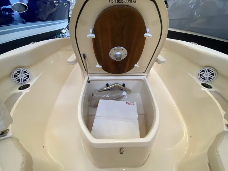 Slide: The Image of Scout 220 XSF 2026 fish box cooler in boat - 10