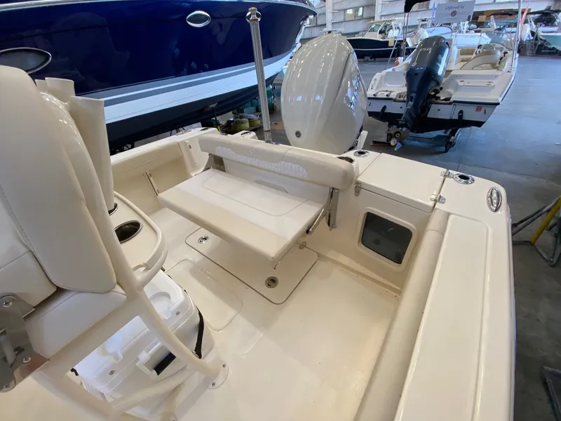 Slide: The Image of Interior of Scout 220 XSF boat, 2026 model, in a boatyard. - 12