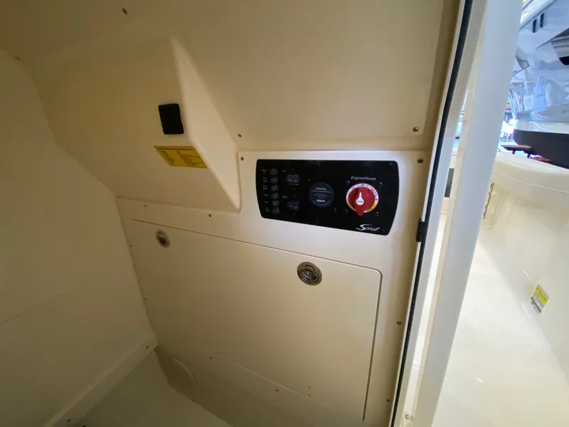 Slide: The Image of Interior view of 2026 Scout 220 XSF with control panel. - 13