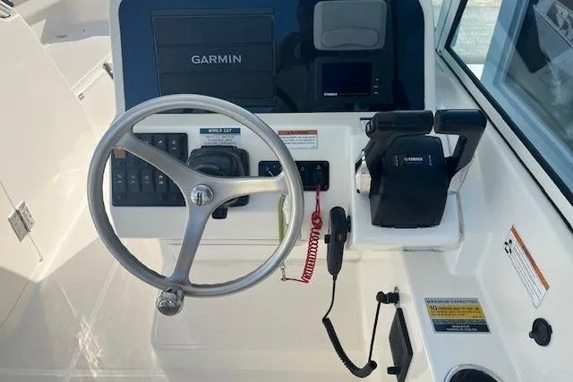 Slide: The Image of Steering console of 2020 World Cat 230 DC with Garmin navigation system. - 4