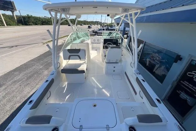 Slide: The Image of 2020 World Cat 230 DC boat with spacious seating and modern design. - 7