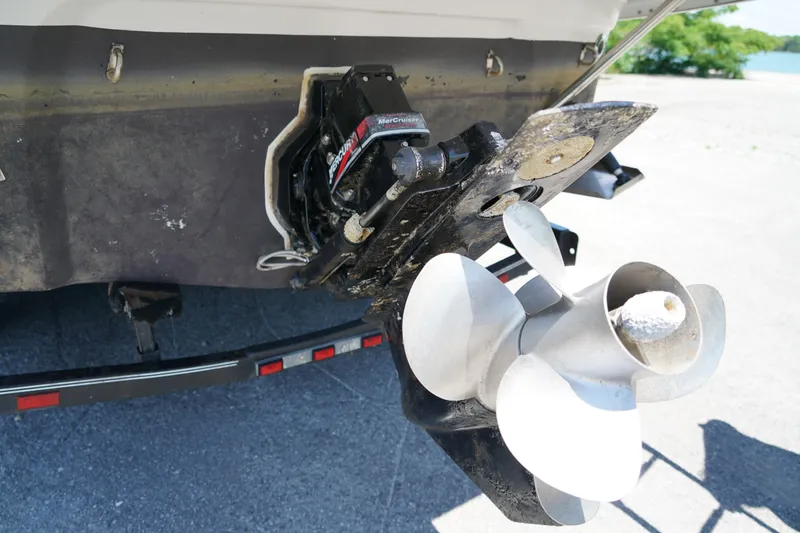 Slide: The Image of 2004 Crownline 250 CR boat stern with MerCruiser outdrive and propeller. - 31