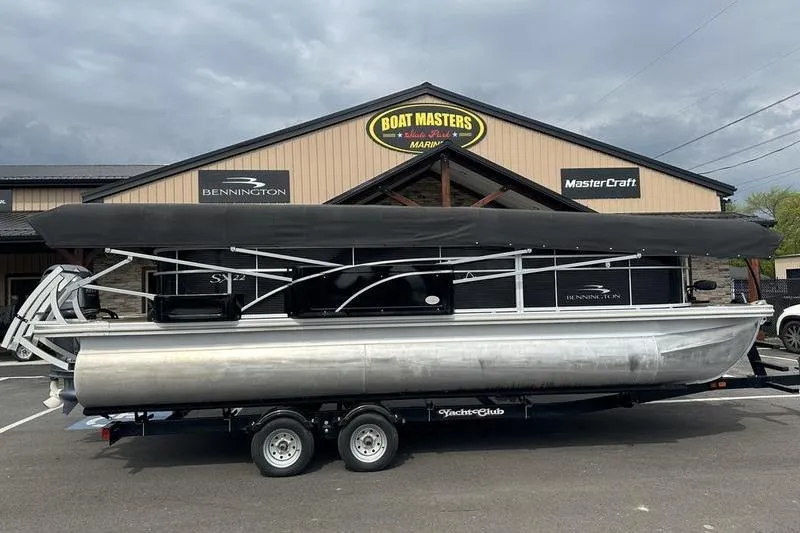 The Image of 2021 Bennington 20 SSRX pontoon boat on trailer at Boat Masters dealership. - 0